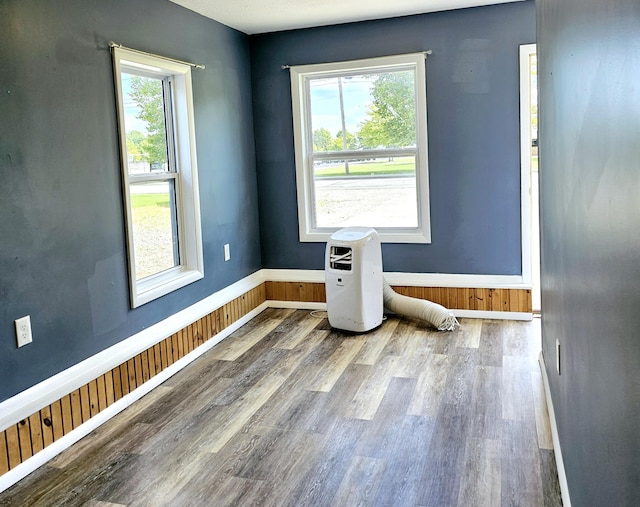 spare room featuring hardwood / wood-style floors