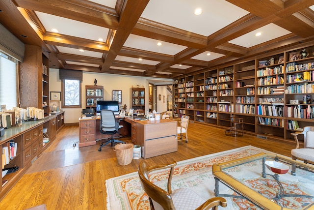 office area featuring beam ceiling, light hardwood / wood-style flooring, and coffered ceiling