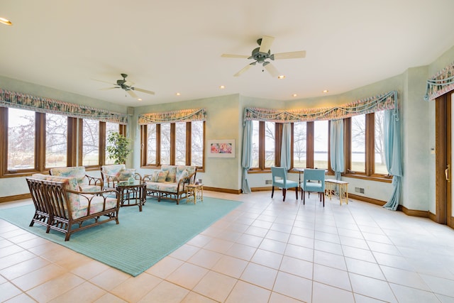 tiled living room featuring ceiling fan