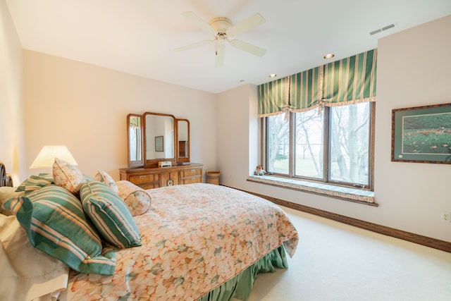 carpeted bedroom with ceiling fan