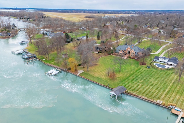 drone / aerial view featuring a rural view and a water view