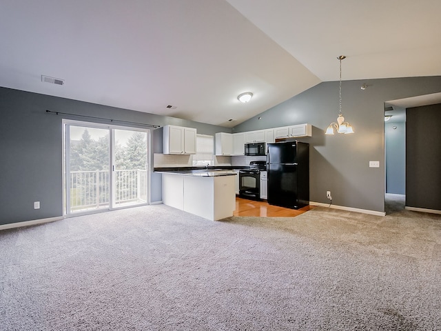 kitchen with light carpet, black appliances, hanging light fixtures, vaulted ceiling, and white cabinetry