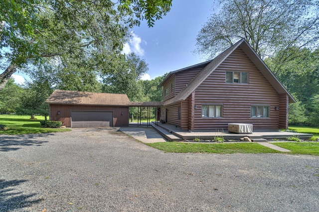 view of log cabin