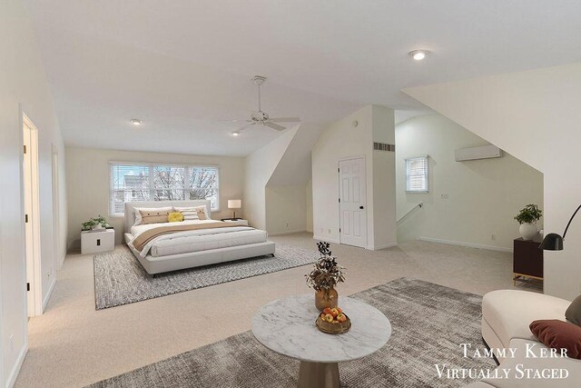 bedroom featuring ceiling fan, light colored carpet, and lofted ceiling