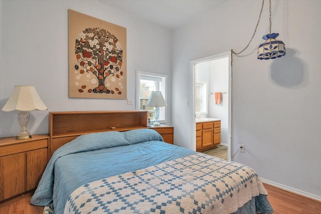 2639 S 3rd St, Niles, MI 49120 - bedroom featuring ensuite bath and light hardwood / wood-style flooring