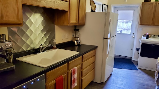 2639 S 3rd St, Niles, MI 49120 - kitchen featuring dishwasher, range, washer / dryer, and sink