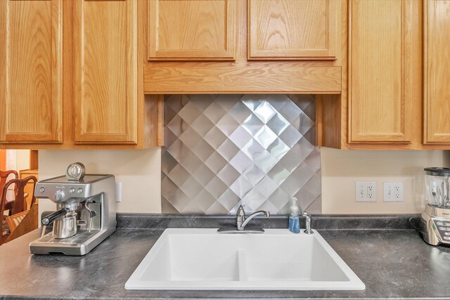 2639 S 3rd St, Niles, MI 49120 - kitchen with decorative backsplash and sink