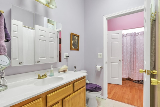 2639 S 3rd St, Niles, MI 49120 - bathroom featuring tile patterned floors, vanity, toilet, and a shower with curtain