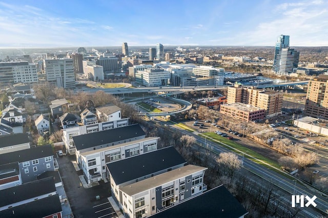 birds eye view of property featuring a city view