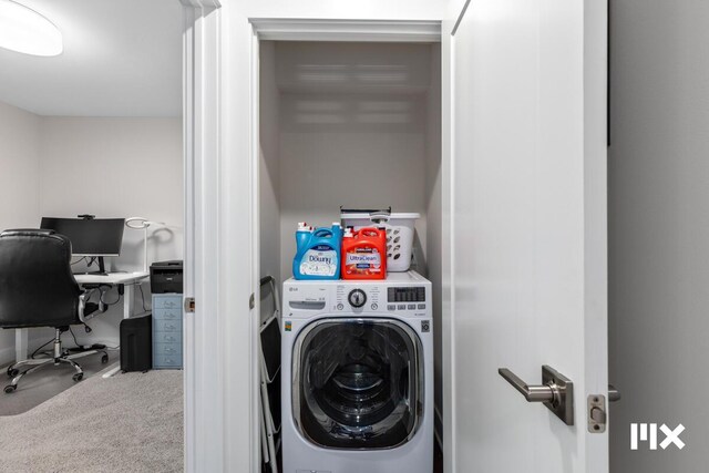 631 Fairview Ave NE Unit 2, Grand Rapids, MI 49503 - washroom featuring washer / dryer, laundry area, and carpet flooring