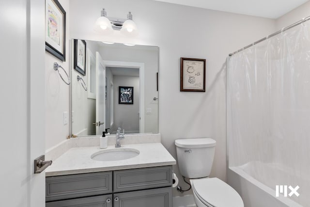 631 Fairview Ave NE Unit 2, Grand Rapids, MI 49503 - full bath with vanity, toilet, and shower / bath combo with shower curtain