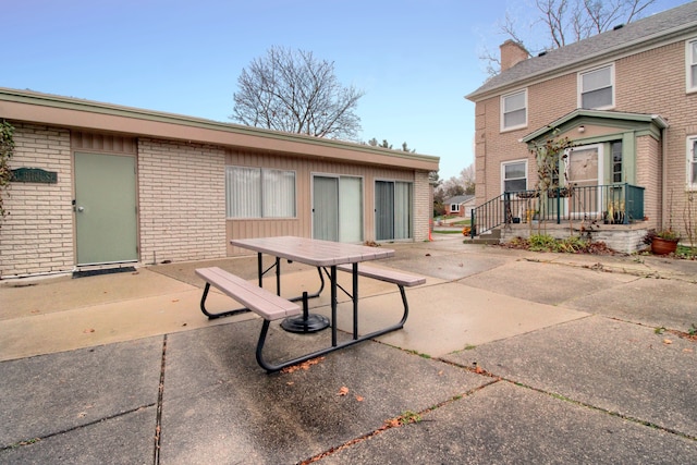 rear view of house featuring a patio area