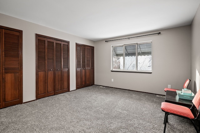 unfurnished room with carpet flooring