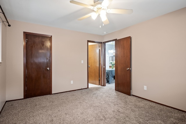 unfurnished bedroom featuring carpet floors, ceiling fan, and a closet