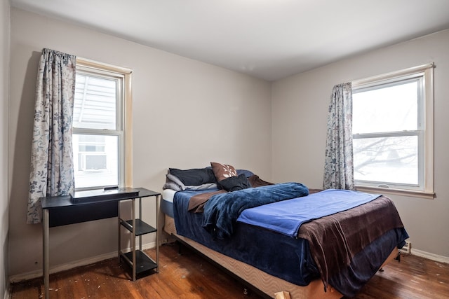 bedroom featuring dark hardwood / wood-style floors