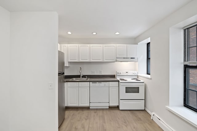 kitchen with white cabinetry, sink, white appliances, and baseboard heating