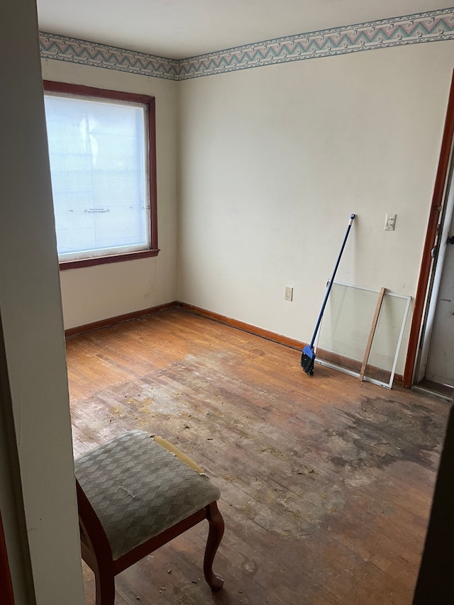 spare room featuring hardwood / wood-style flooring