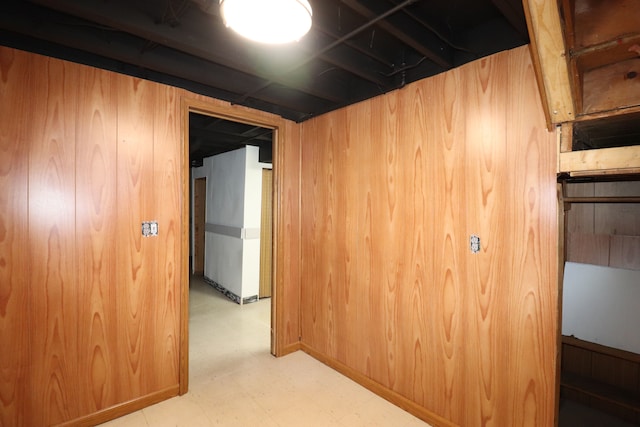 interior space featuring wood walls