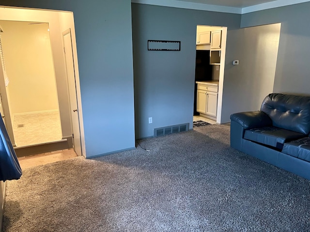 living room with carpet floors and crown molding