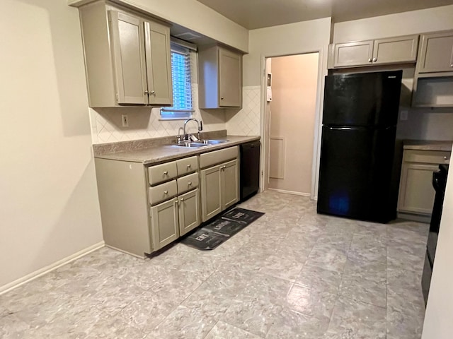 kitchen with backsplash, gray cabinets, sink, and black appliances