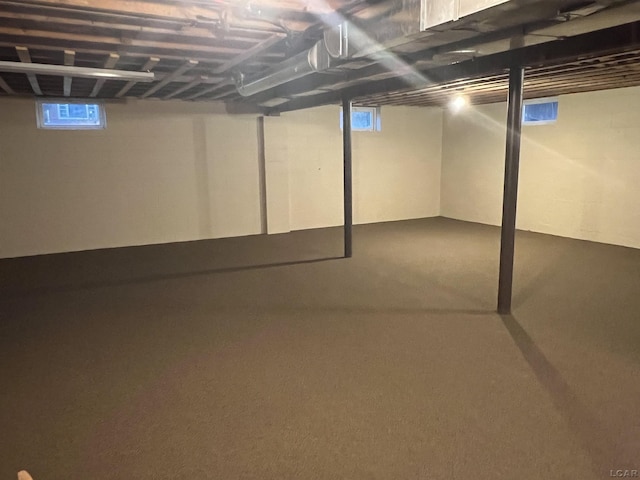 basement with carpet flooring