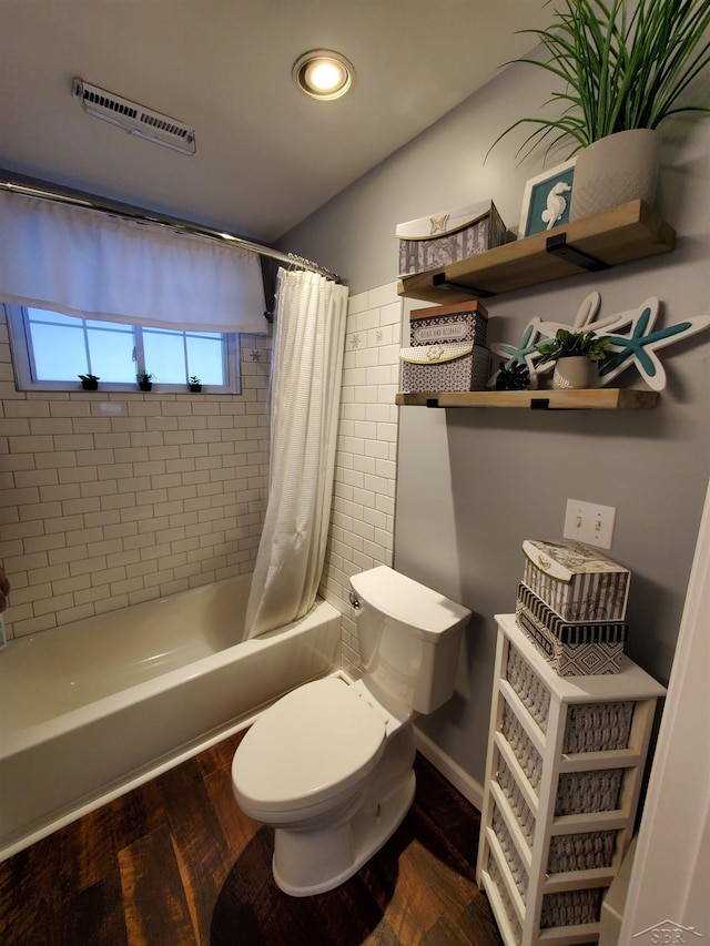 full bathroom with toilet, recessed lighting, shower / tub combo, wood finished floors, and visible vents