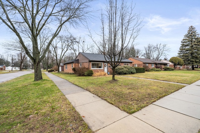 view of front of home with a front yard