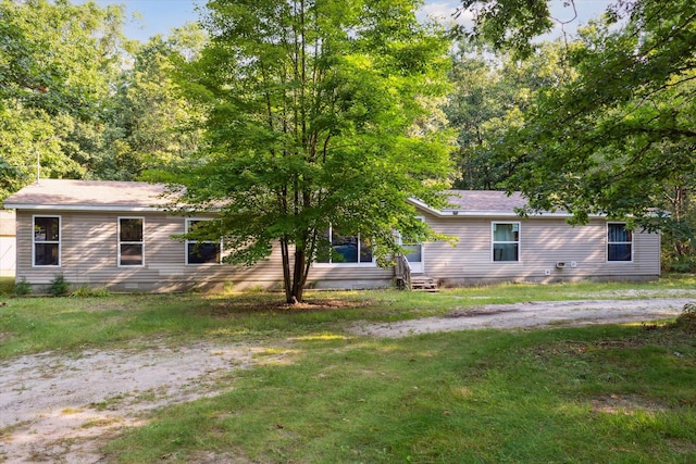 view of front of home with a front lawn