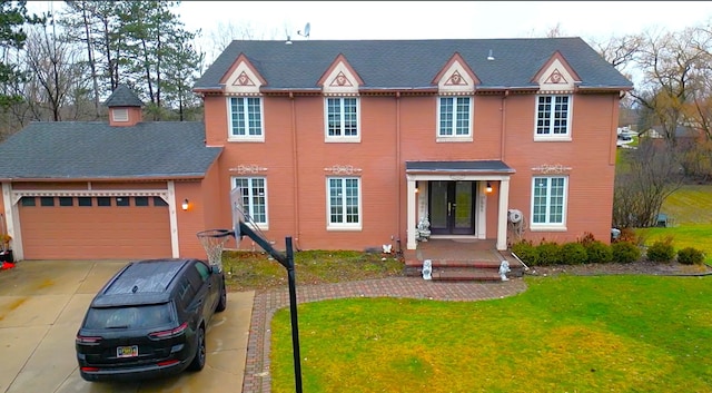 view of front of house featuring a front yard and french doors