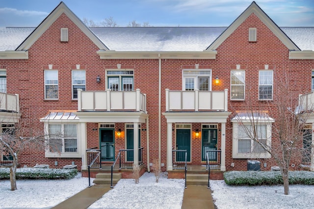 townhome / multi-family property with a balcony