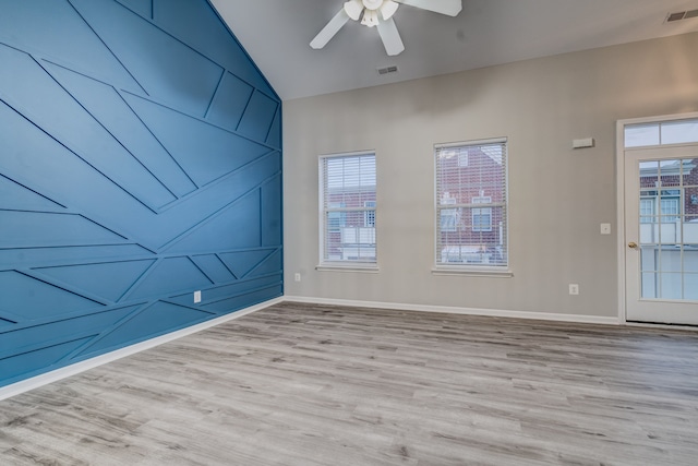 spare room with ceiling fan, light hardwood / wood-style flooring, and plenty of natural light