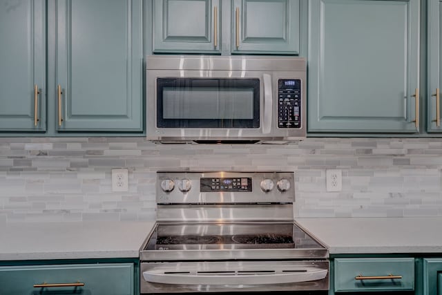 kitchen featuring backsplash and appliances with stainless steel finishes