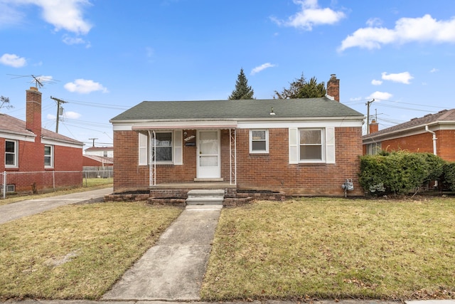 bungalow with a front yard