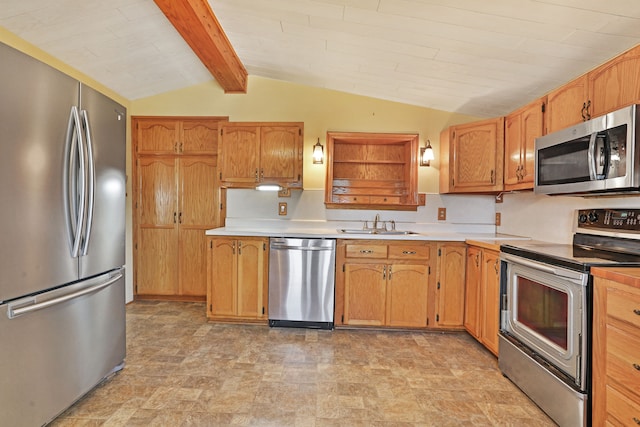 kitchen with appliances with stainless steel finishes, lofted ceiling with beams, and sink