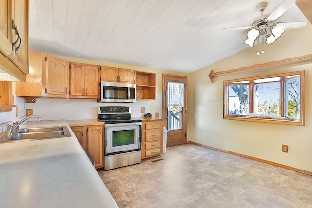 kitchen featuring wood ceiling, ceiling fan, sink, and stainless steel appliances