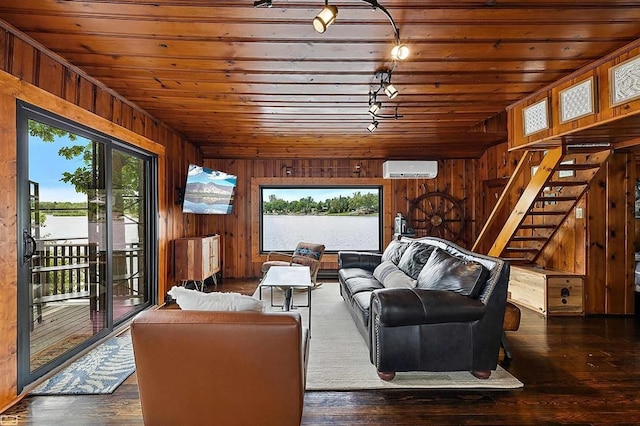 living room featuring dark hardwood / wood-style flooring, a wall unit AC, wood walls, and wood ceiling