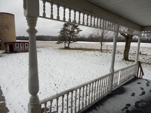 view of snow covered deck