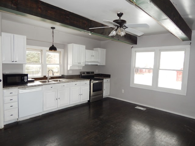 kitchen with stainless steel range with electric stovetop, white dishwasher, sink, ceiling fan, and decorative light fixtures