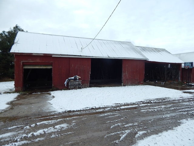 view of snow covered garage