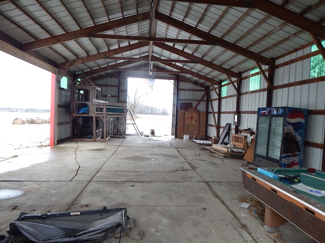 miscellaneous room featuring high vaulted ceiling