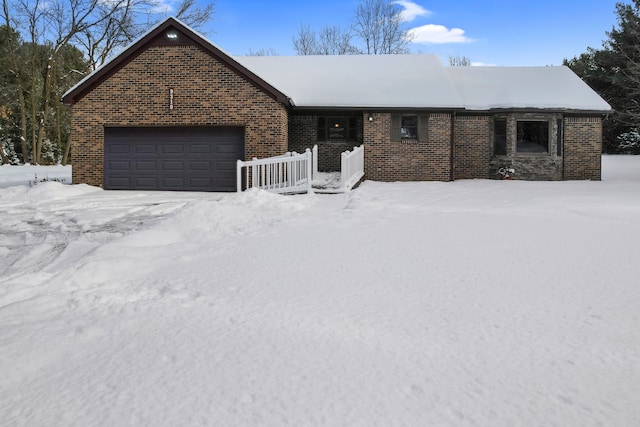 ranch-style home with a garage