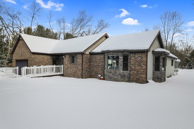 view of snow covered property