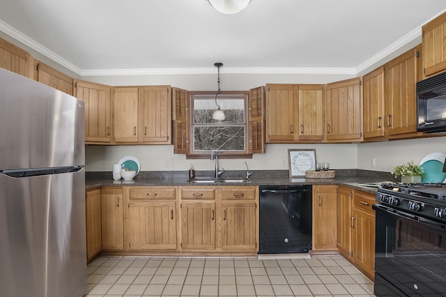 kitchen with ornamental molding, sink, decorative light fixtures, and black appliances