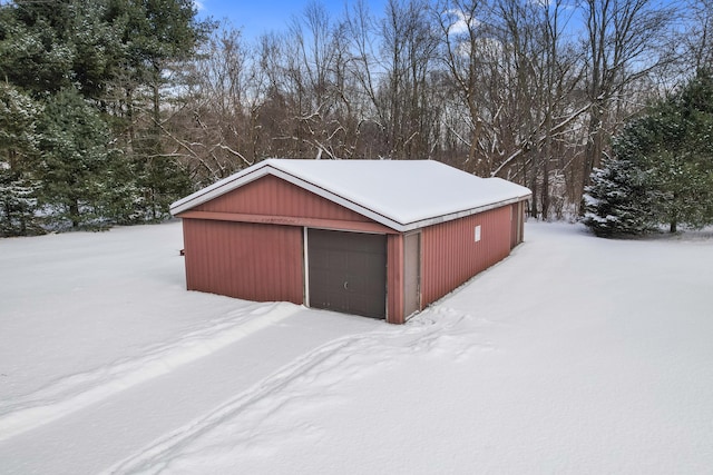 view of snow covered garage