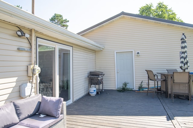 wooden terrace with grilling area