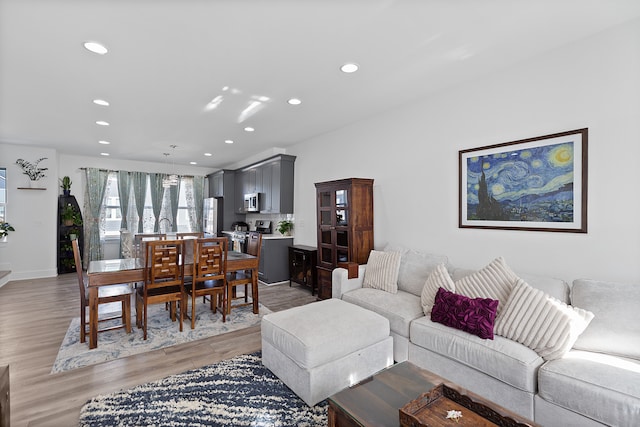 living room with hardwood / wood-style floors