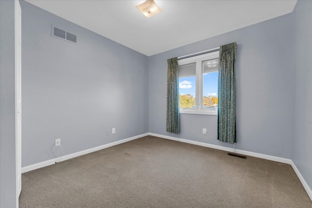 unfurnished room featuring carpet flooring