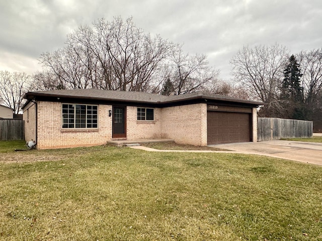 ranch-style house with a front lawn and a garage