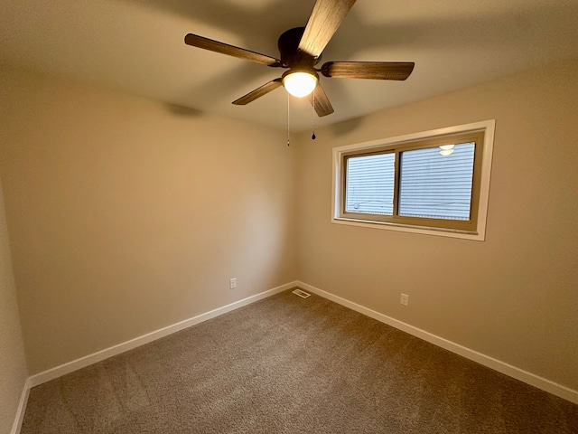 unfurnished room with carpet and ceiling fan