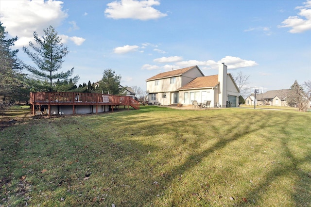 view of yard featuring a wooden deck